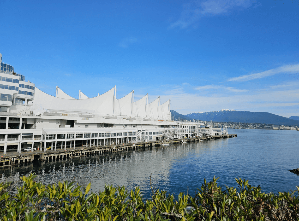 Vancouver skyline with mountains in the background and harbor in foreground